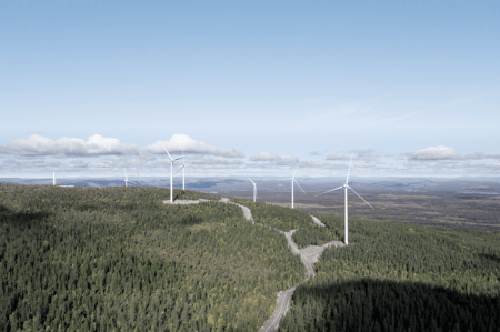 Metsäisellä alueella tuulivoimapuisto, jossa useita tuuliturbiineja sinisen taivaan alla.